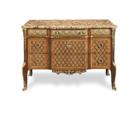 A French late 19th century ormolu mounted mahogany, bois satine, amaranth and stained sycamore marquetry commode a la Greque 