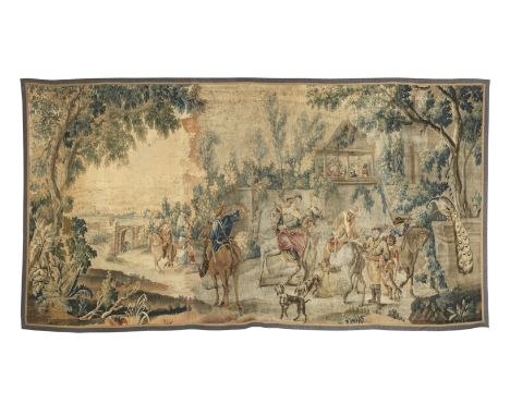 An Aubusson tapestryFrench, 18th centuryThe main field depicting figures on horseback in elaborate costume, one blowing a hun