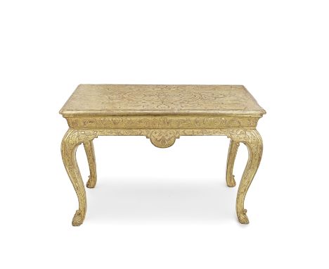 A George I gilt gesso side table1720-1726, possibly by John BelchierThe top with an ovolo moulded edge and re-entrant front a