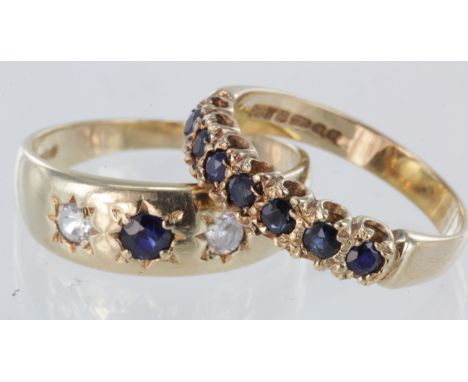 Two 9ct sapphire rings. 9ct sapphire and cz three stone ring, size R, weight 3.3g. 9ct sapphire half eternity ring, size P, 3