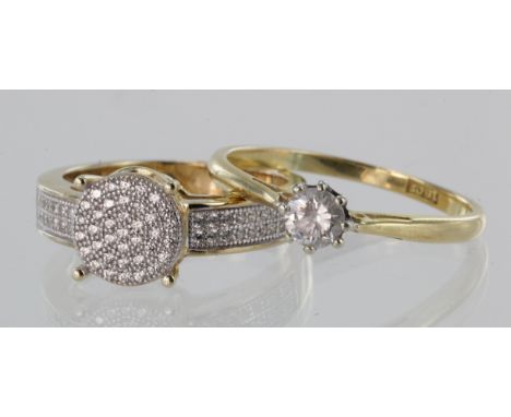 Two diamond rings. 18ct gold diamond solitaire ring, approx. 0.33ct, size R, weight 2.2g. 9ct multi diamond dress ring, size 