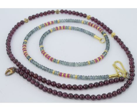 Ruby and Emerald beaded choker necklace (approx 38.5cm) on a high carat gold clasp along with a beaded garnet necklace (appro