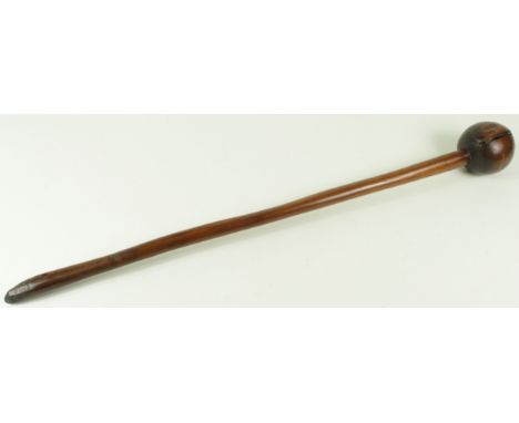 Knobkerrie. An original carved knobkerrie, circa early 20th Century, split to head, length 71cm approx.