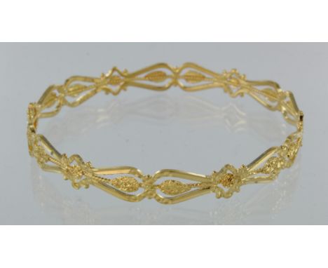 22ct yellow gold fancy patterned slave bangle, weight 16.6g