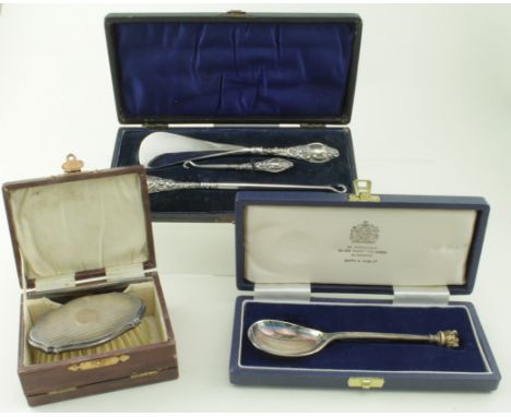 Three silver/silver mounted boxed items, comprising a three piece button hook &amp; shoe horn set, small brush &amp; comb set