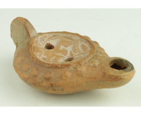 Ancient Roman circa 200 A.D. terracotta oil lamp depicting lion - arnos jumperz ollection - germany -100 mm