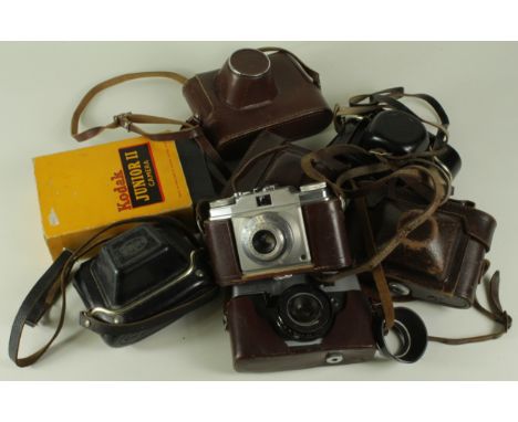 Cameras. A collection of eight vintage cameras, comprising Kodak Junior II (boxed), Ilford Sporti, Paxina, Halina Paulette, P