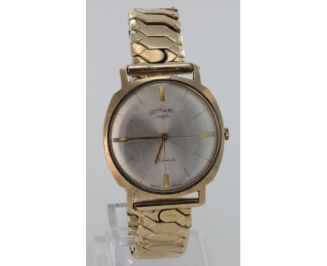Gents 9ct cased wristwatch by "Rotary", on a non gold expandable bracelet. Watch working when catalogued