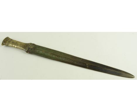 Unidentified Middle Eastern dagger with decorative brass handle, engraved to blade, no scabard, total length 48.5cm approx.