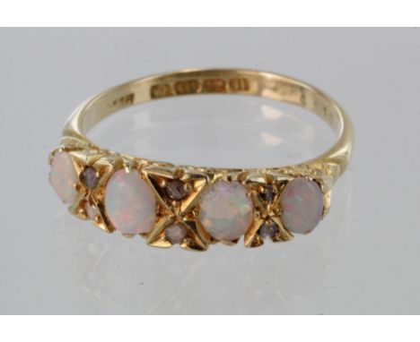 18ct yellow gold opal and diamond carved head ring, size R, weight 4.5g