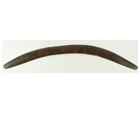 Aboriginal hunting boomerang, circa late 19th Century to early 20th Century, with incised decoration depicting kangeroos, len