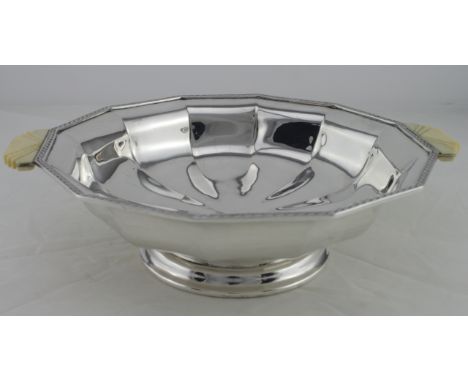Art Deco silver fruit dish with moulded ivorine handles hallmarked for Goldsmiths &amp; Silversmiths Sheffield 1935. Weighs 1