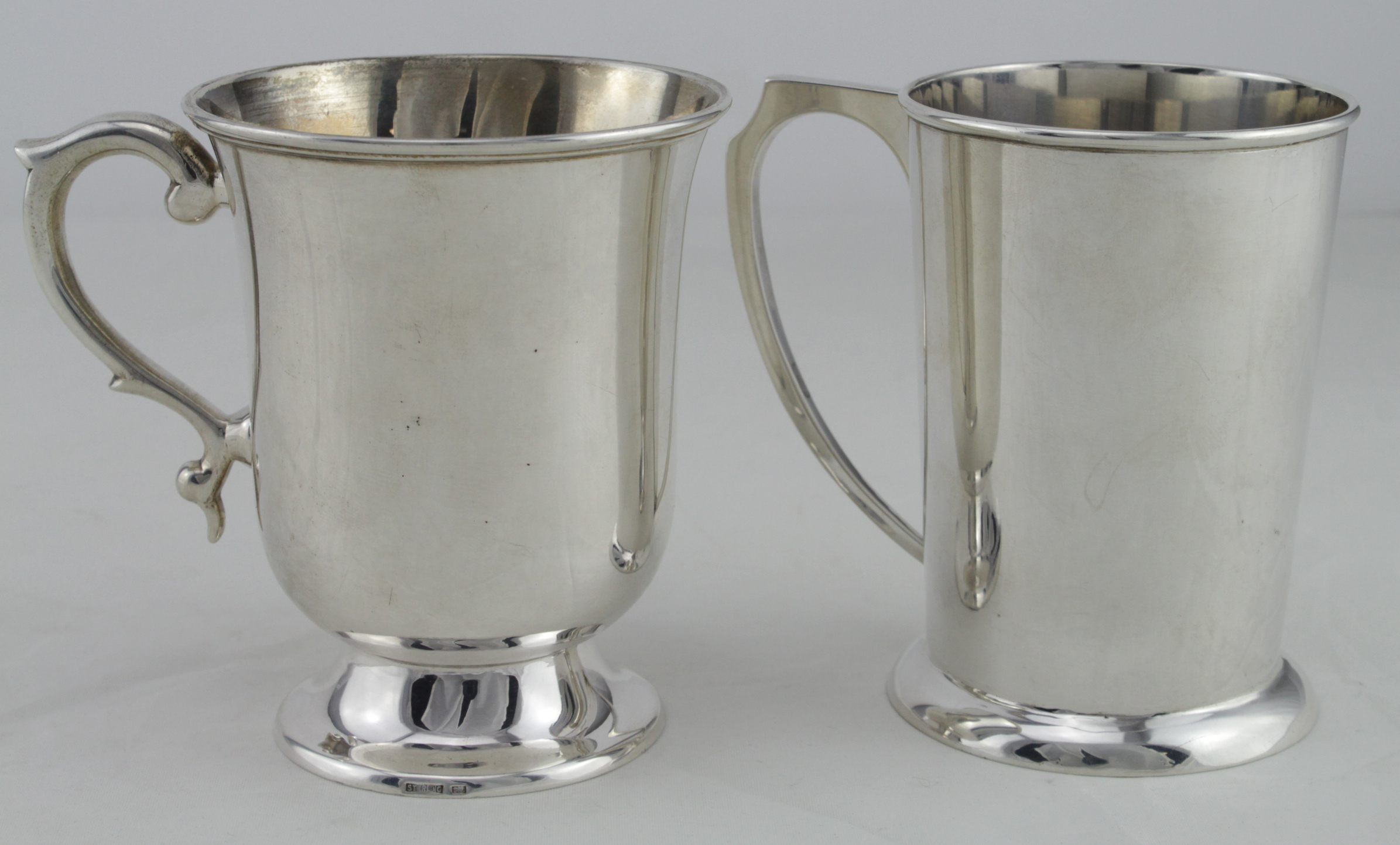 Two silver cups, both stamped 'Sterling', height 90mm & 88mm, total ...