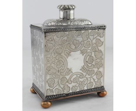 White metal &amp; copper ornately decorated tea caddy, raised on four ball feet, marks rubbed, height 13.5cm, width 10cm, dep