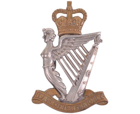 EIIR North Irish Brigade Officers Cap Badge, two piece silver gilt example in the form of a crowned winged harp standing on a