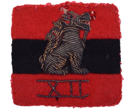 WW2 12th Army Formation Sign, being a red/black/red divided square with bullion embroidered figure of a dragon with bullion w
