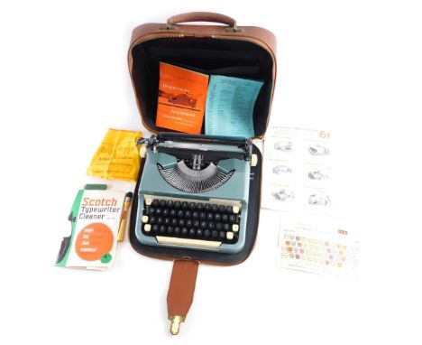 A vintage Imperial Good Companion typewriter, in outer case, 30cm wide.