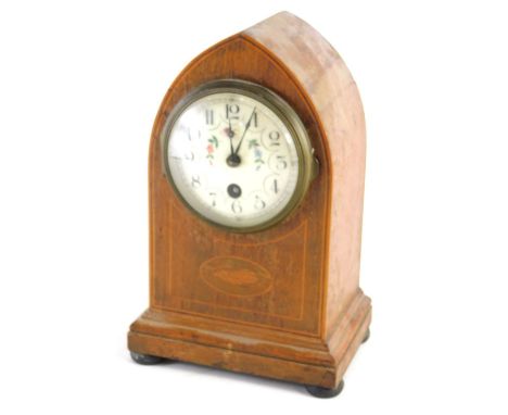 A 19thC mahogany dome topped mantel clock, with floral Arabic 9cm diameter dial, inlaid case, keywind movement striking on th