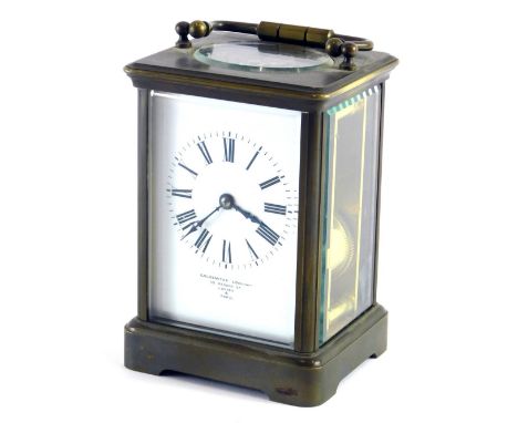 A 20thC brass Goldsmiths carriage clock, with 7cm wide Roman numeric dial, visible single train keywind movement, with swing 