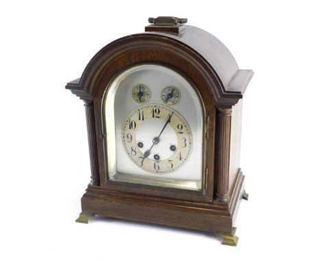 A late 19thC chiming bracket clock, with arched plate back, 13cm Arabic dial, fast slow chime silent features, in domed case,