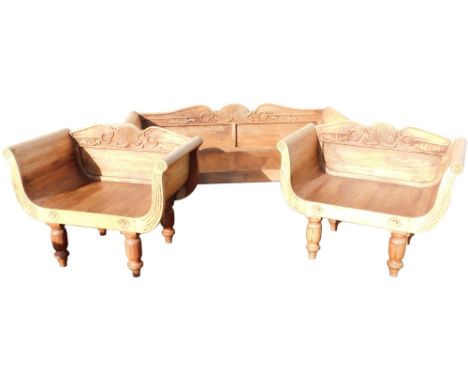 An Eastern colonial style hardwood suite of seating furniture, comprising a sofa with a leaf carved shaped back, solid seat a