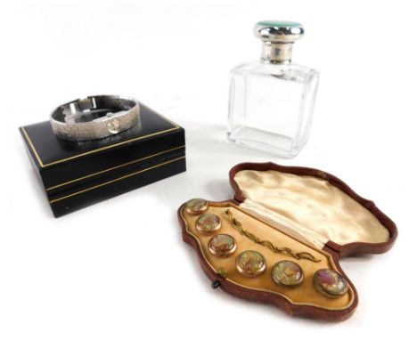 An Accurist cocktail watch, in fitted case with paperwork, a cut glass perfume bottle with silver and enamel lid, and a colla