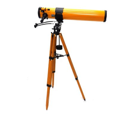 A Barlow freestanding telescope, on tripod base, the main body in orange with black trim, 92cm long.