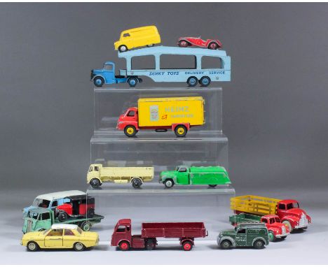 A collection of Dinky diecast model vehicles, including - Supertoys Leyland Comet in red and yellow, a Supertoys Big Bedford 