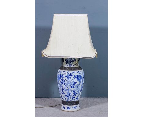 A Chinese blue and white crackleware two-handled vase of baluster form, the neck moulded in relief with prunus blossoms, the 