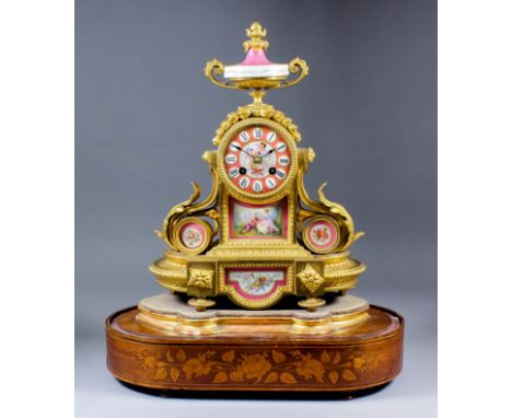 A late 19th Century French gilt metal and porcelain mounted mantel clock by Japy Freres No. 2156, the 3.25ins diameter porcel