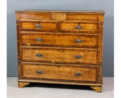 A 19th Century "North Country" oak and mahogany banded chest with moulded edge to top, fitted two plain frieze drawers, two s