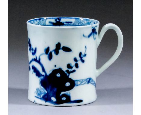 An 18th Century Worcester blue and white porcelain ear-handled coffee cup painted with "The Warbler" pattern, circa 1754-1760