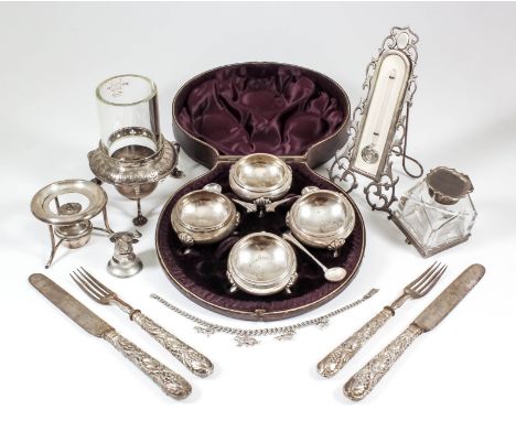 A set of four Victorian silver circular salts, with moulded rims and on three leaf capped scroll feet, 2ins diameter x 1.25in