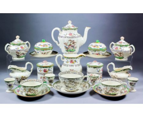 An early 20th Century Copeland Spode pottery part breakfast and tea service, printed and painted with an exotic bird pattern 