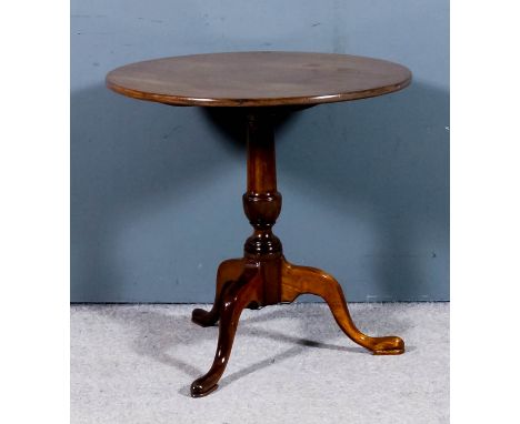 A George III "Cuban" mahogany circular tripod occasional table with plain one piece top on turned central column, and cabriol