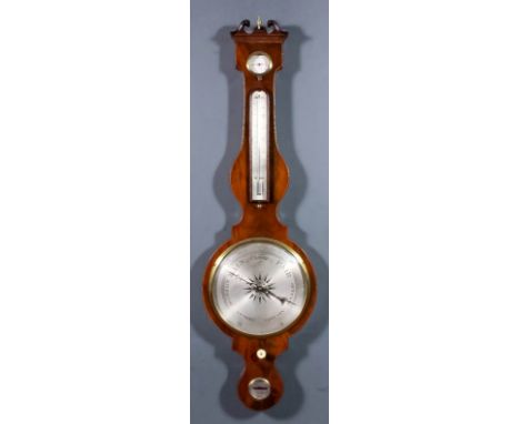 A late 18th Century/early 19th Century mahogany wheel cased barometer, thermometer, and hydrometer by Pegler of Blandford wit