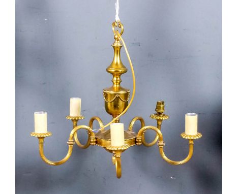 A brass five light electrolier of Neo-classical design, the central pattern column with rope mouldings and pineapple finial, 