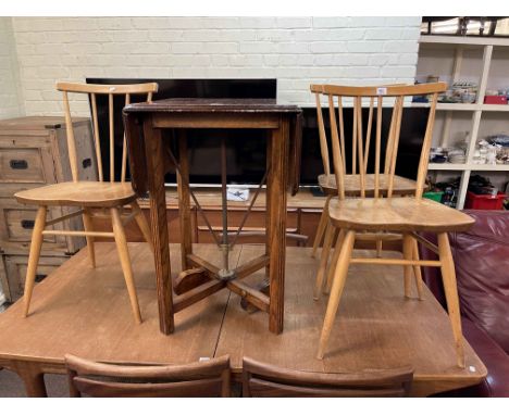 Unusual early 20th Century Iles patent oak drop leaf table, design number 884923, and set of three vintage Ercol dining chair
