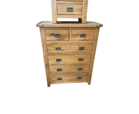 Contemporary light oak chest of two short above four long drawers, 120cm by 95cm by 44cm.