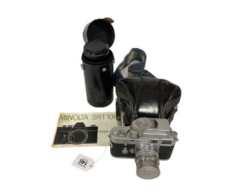A Leica M2 Rangefinder camera, M3-739 731, chrome body with Leitz Wetzlar Lens serial number 820194, light meter is 02957, to