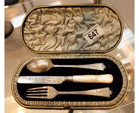 Hallmarked silver Christening set, knife, fork and spoon with heavy foliate engraving.  Assay Birmingham, 1890. Maker H&T