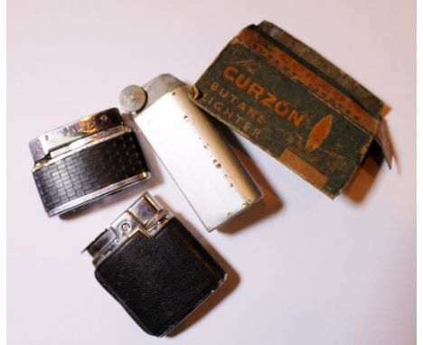 Box of vintage cigarette lighters