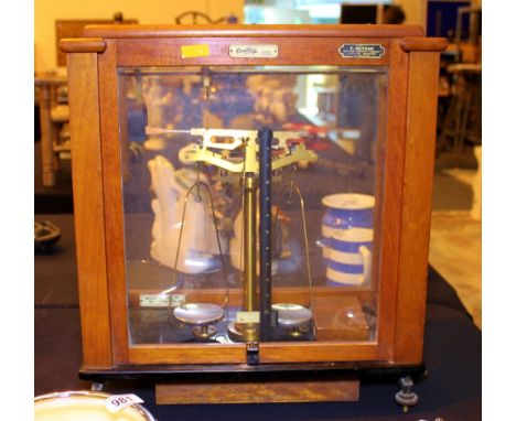 Wood and glass cased Oertling scientific scale with weights 