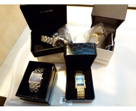 Four boxed wristwatches including Accurist chronograph