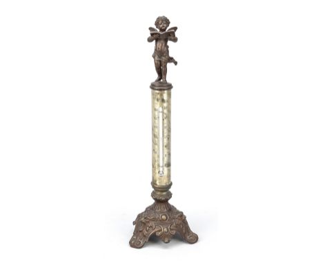 Thermometer, Ende 19. Jh., Säule mit Quecksilbersäule auf dreipassigem Sockel mit Maskarons. Aufsatz als singender Engel, ber