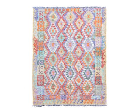 A contemporary hand-knotted pure wool kilim carpet, of typical geometric design in vibrant vegetable dyes290 x 207cmIn as new