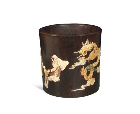 A Chinese zitan-type stone inlaid brush pot, in 17th century style,  worked in relief with diversely coloured soapstone. moth