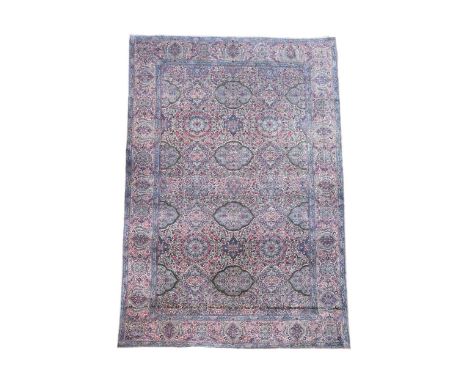 A fine Kirman carpet, with an intricate floral design on a natural ground510 x 328cmExcellent even pile with minimal signs of