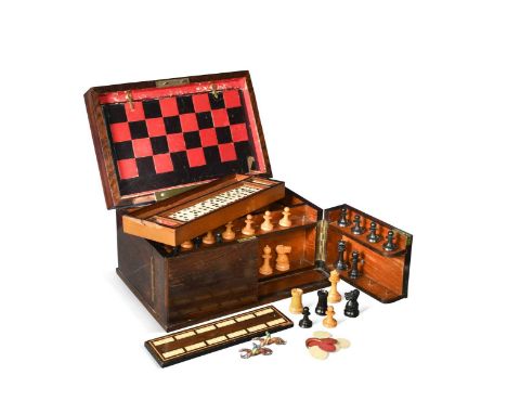 A Victorian rosewood games compendium,  the hinged lid opening to reveal a leather chess board within, the front opening to a