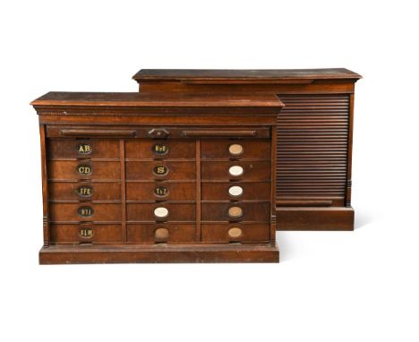 Two Amberg's tambour fronted walnut cabinets, circa 1900, one comprising of fifteen filing drawers labelled both alphabetical